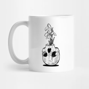 Snowdrops and a skull Mug